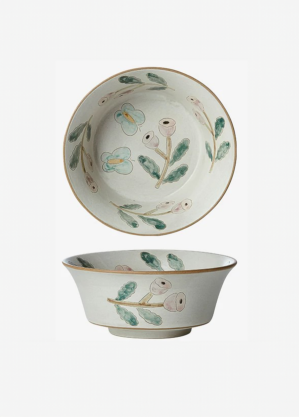 ceramic bowls with floral patterns, one with a full view and the other with a partial view focusing on the rim.