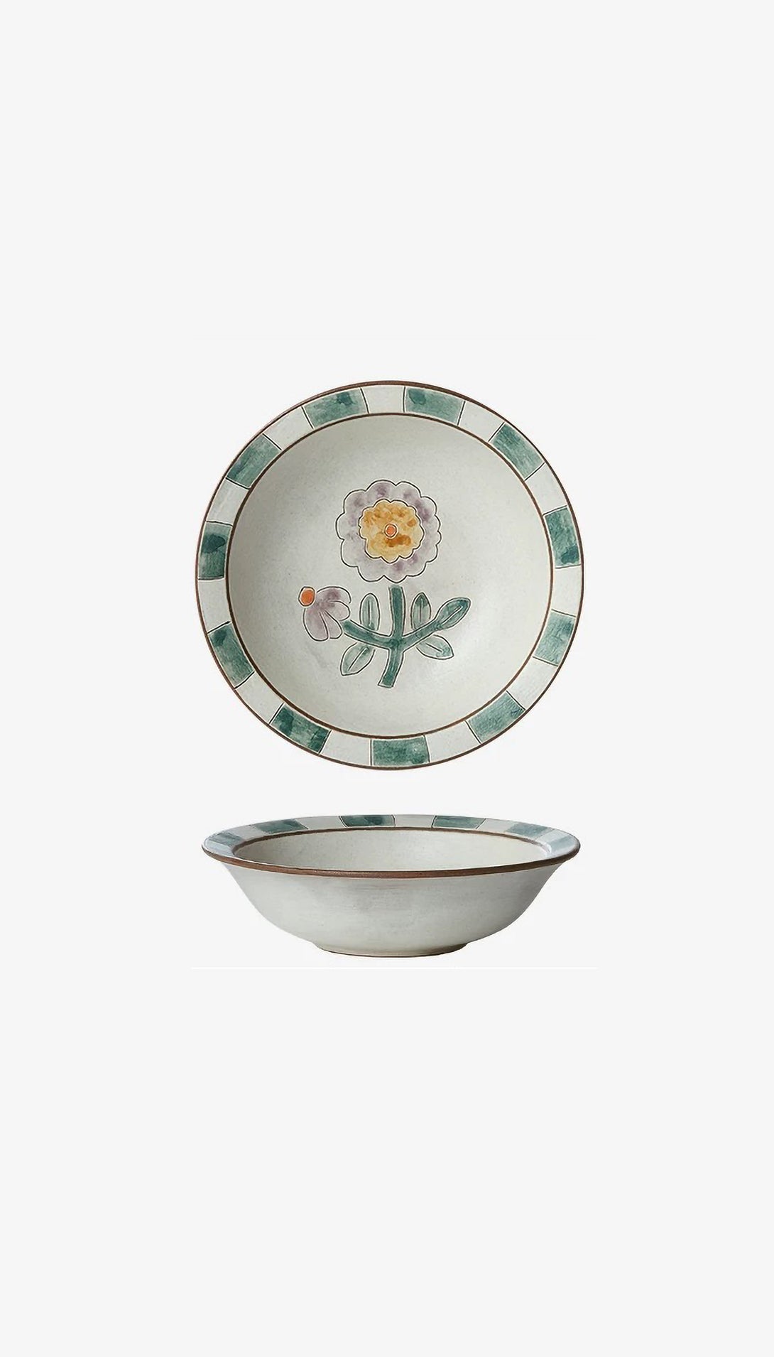 A ceramic bowl with green tile design around the rim and a floral pattern in the center, viewed from the side and top angles.