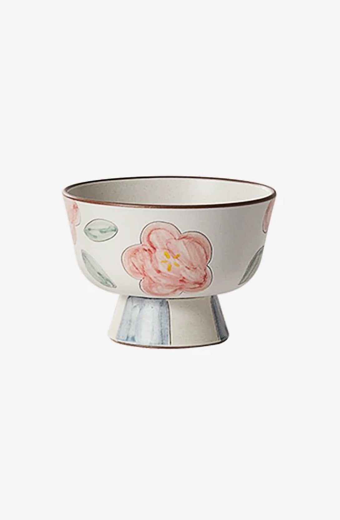 A beige ceramic bowl with a floral pattern and a gold rim.