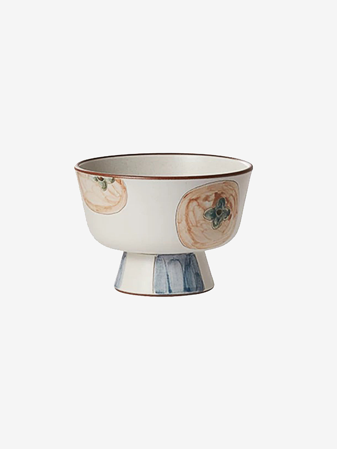 A beige ceramic bowl with floral patterns and a blue rim.