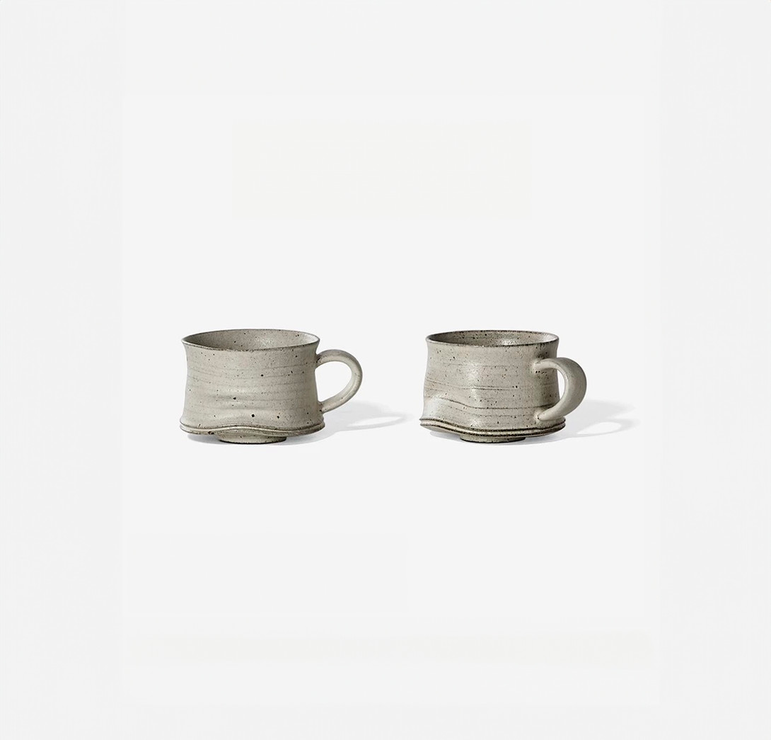 Two gray ceramic mugs on a white background