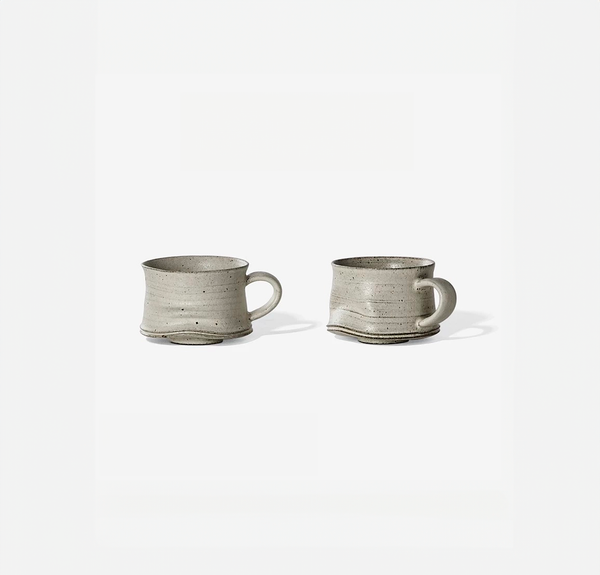 Two gray ceramic mugs on a white background