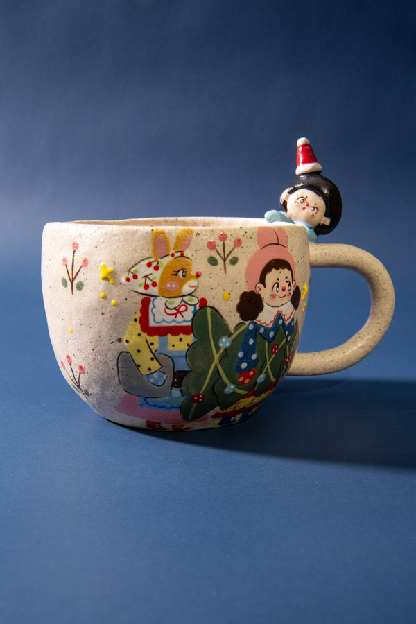 christmas mug with cartoon characters on a blue background