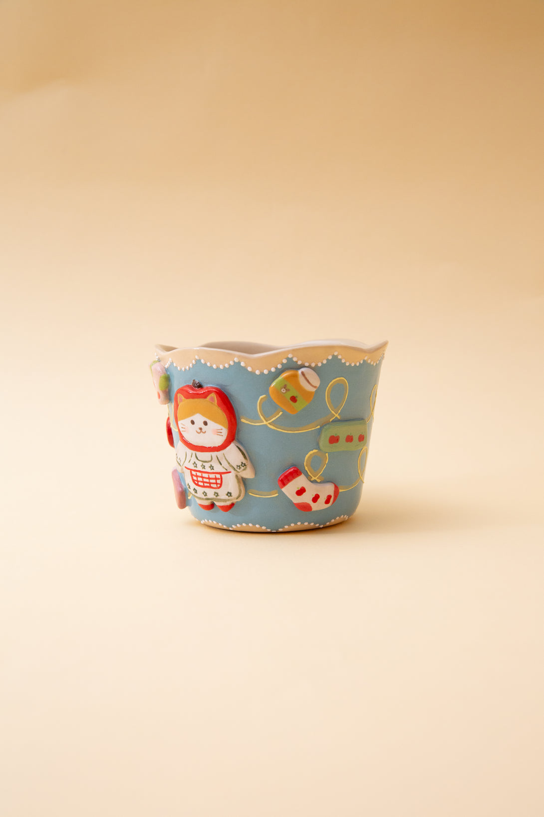 mug with cartoon character design on a beige background
