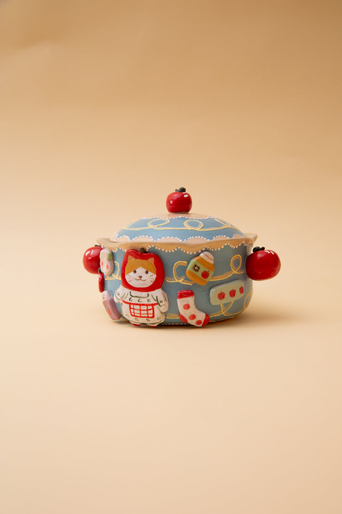 ceramic bowl with cartoon character design on a beige background