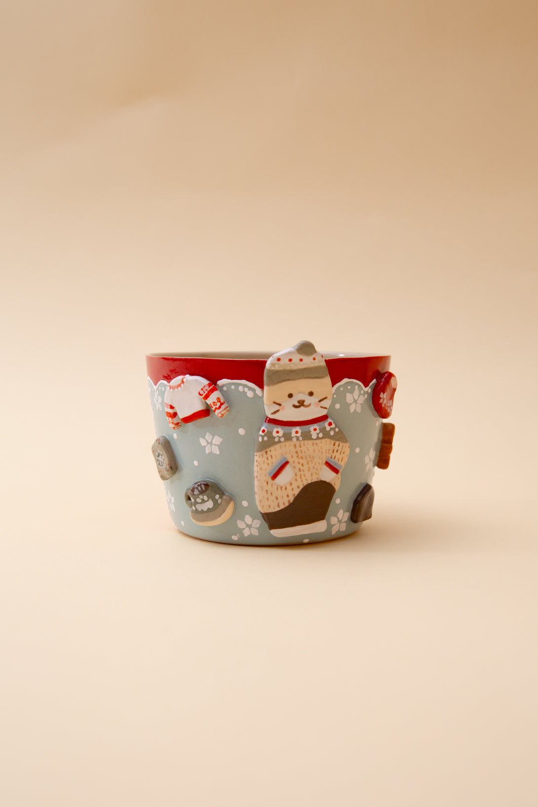 Handmade Mug with cat illustrations on a beige background