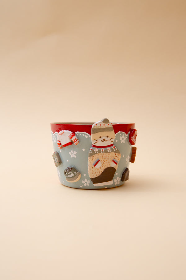 Handmade Mug with cat illustrations on a beige background